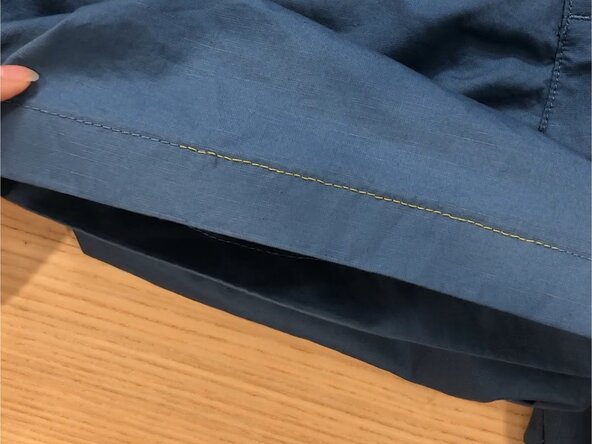 Backstitch on a Loose Hem, Trim the thread: crwdns2935265:08crwdnd2935265:03crwdnd2935265:03crwdne2935265:0