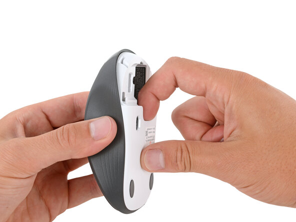 How to Open Your Logitech M310 Wireless Mouse, Separate the mouse halves: crwdns2935265:05crwdnd2935265:01crwdnd2935265:03crwdne2935265:0