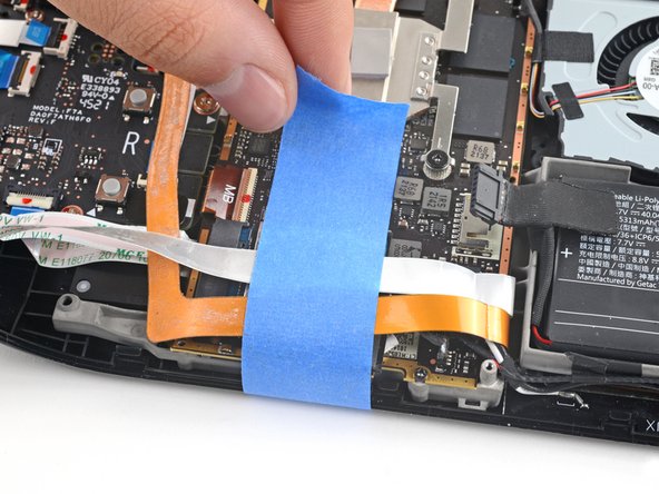 Steam Deck Battery Replacement, Peel back the button board cable: crwdns2935265:013crwdnd2935265:03crwdnd2935265:03crwdne2935265:0