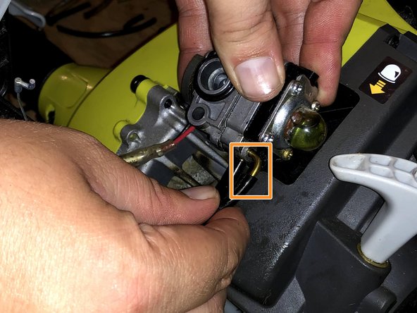 Attach the input fuel line back to the carburetor.
