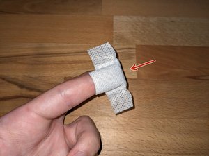 How to apply an Adhesive Bandage on a Fingertip - iFixit Repair Guide