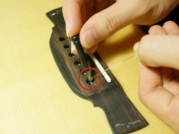 How to restring an Acoustic Guitar: crwdns2935265:03crwdnd2935265:02crwdnd2935265:03crwdne2935265:0