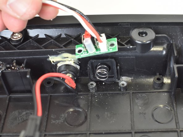 Hover-1 Coast Power Button Spring Replacement, Power Button Spring: passo 5, immagine 3 di 3