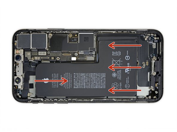Flip the iPhone back over and thread a strong piece of string (such as dental floss or a length of thin guitar string) underneath the battery.