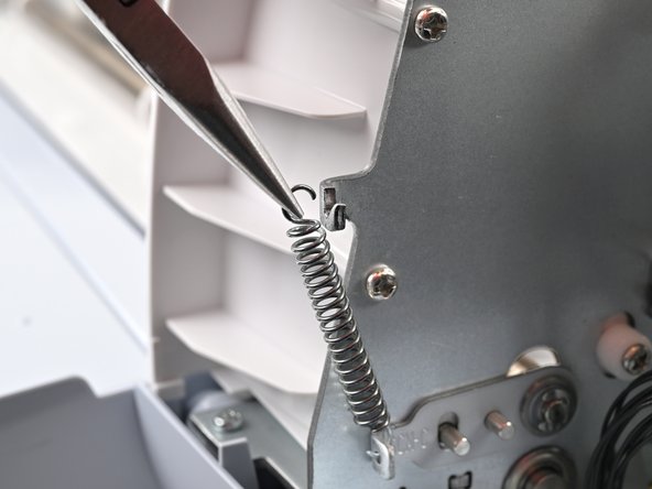 Cricut Maker 3 Rubber Rollers Replacement, Remove the right roller bar spring: crwdns2935265:017crwdnd2935265:02crwdnd2935265:02crwdne2935265:0