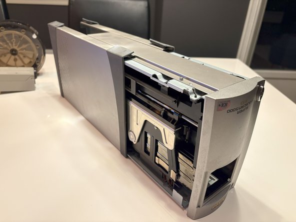 Cleaning the mirror, Remove hidden screws under Rubber pads: crwdns2935265:03crwdnd2935265:03crwdnd2935265:03crwdne2935265:0