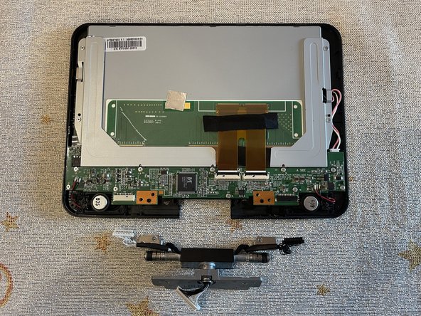 Sony DVP-FX820 Full Teardown, Removing the Hinge: crwdns2935265:021crwdnd2935265:03crwdnd2935265:03crwdne2935265:0