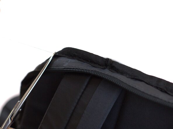 How to fix a Detached Backpack Strap, Clean the area: crwdns2935265:07crwdnd2935265:01crwdnd2935265:03crwdne2935265:0