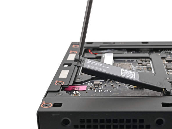 Framework Desktop DIY Edition Quick Start Guide, Loosen the secondary storage screw: crwdns2935265:024crwdnd2935265:03crwdnd2935265:03crwdne2935265:0