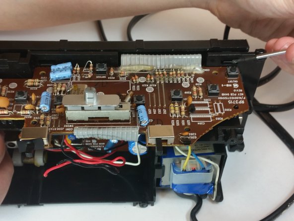 RCA RP3715A Motherboard Replacement, Unlatch release tabs: crwdns2935265:09crwdnd2935265:02crwdnd2935265:03crwdne2935265:0