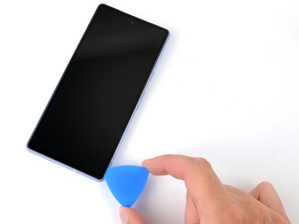 Google Pixel 7a Screen Replacement, Separate the right edge adhesive: crwdns2935265:06crwdnd2935265:02crwdnd2935265:02crwdne2935265:0