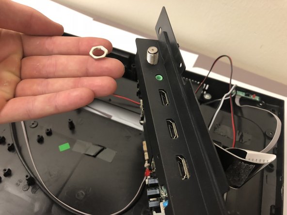 Insignia NS-24ER310NA17 Input/Output Cover Replacement, Input/Output Board Covers: crwdns2935265:016crwdnd2935265:02crwdnd2935265:02crwdne2935265:0