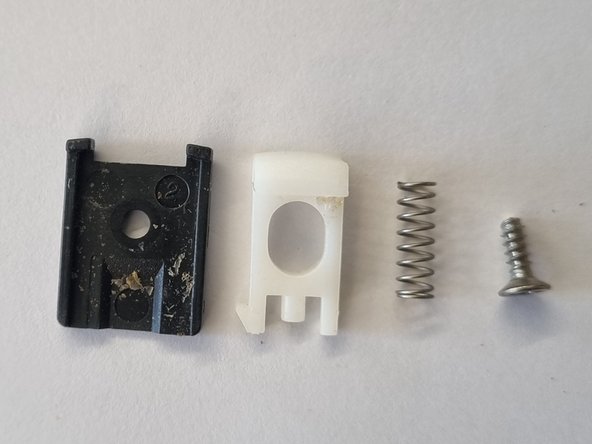 Midea FC307B Rice Cooker Teardown, Top latch disassembly: crwdns2935265:03crwdnd2935265:02crwdnd2935265:03crwdne2935265:0