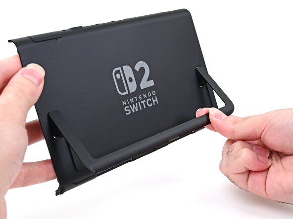 Nintendo Switch 2 Kickstand Replacement, Install the kickstand: crwdns2935265:025crwdnd2935265:02crwdnd2935265:03crwdne2935265:0