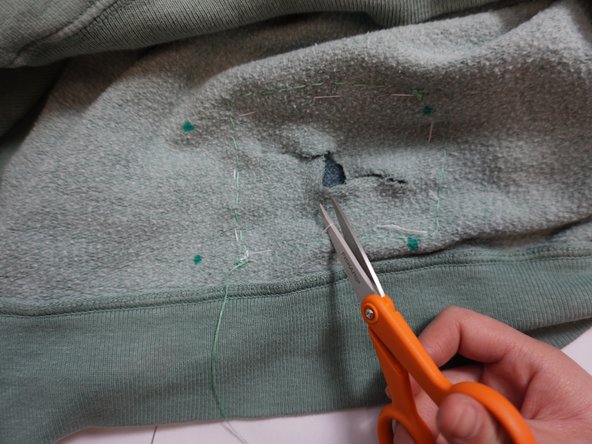 How to Patch a Hole in Pullover Hoodie with Fabric: crwdns2935265:07crwdnd2935265:03crwdnd2935265:03crwdne2935265:0