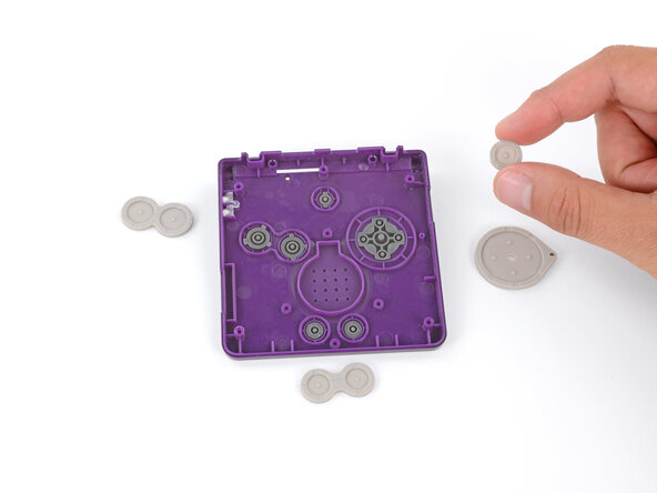 How to Reshell Your Game Boy Advance SP, Remove the buttons: crwdns2935265:042crwdnd2935265:02crwdnd2935265:03crwdne2935265:0