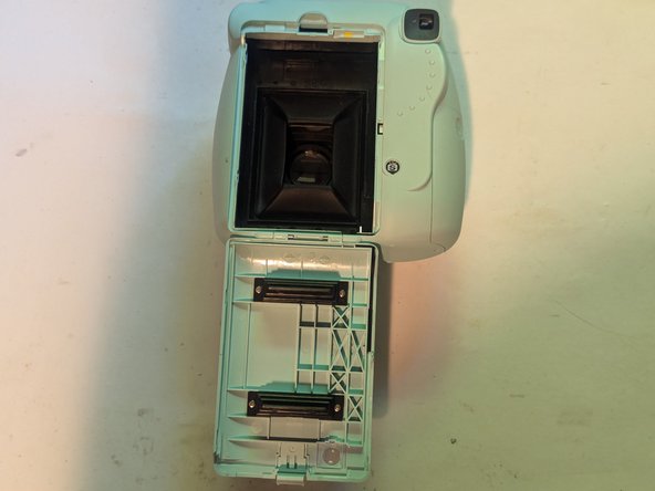Fujifilm Instax Mini 9 Camera Shell Replacement, Remove the Film: crwdns2935265:05crwdnd2935265:03crwdnd2935265:03crwdne2935265:0