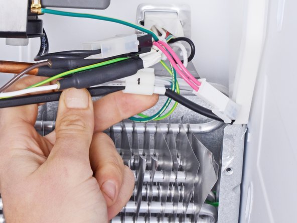 Whirlpool Refrigerator Freezer Thermistor Replacement, Unclip the thermistor: crwdns2935265:07crwdnd2935265:02crwdnd2935265:03crwdne2935265:0