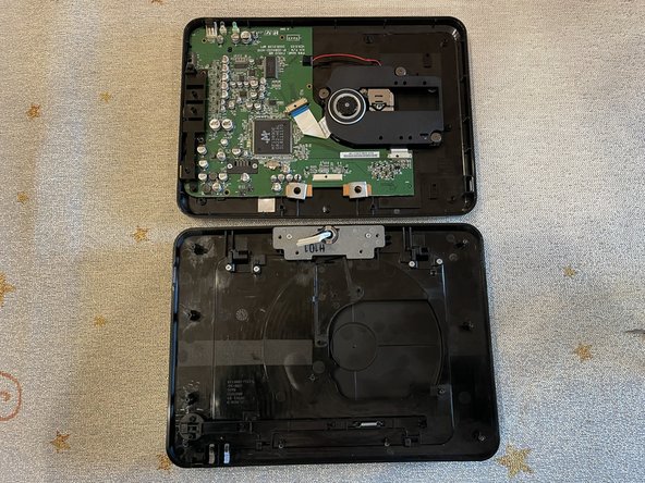 Sony DVP-FX820 Full Teardown, Opening the Bottom Cover: crwdns2935265:05crwdnd2935265:03crwdnd2935265:03crwdne2935265:0