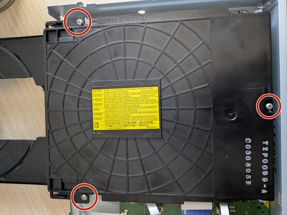 Panasonic DP-UB150-K Laser Replacement, Fasten the drive cover in place: crwdns2935265:015crwdnd2935265:03crwdnd2935265:03crwdne2935265:0