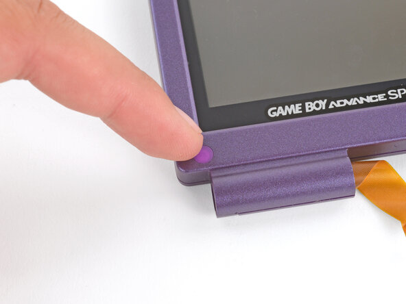 How to Reshell Your Game Boy Advance SP, Install the rubber screw covers: crwdns2935265:041crwdnd2935265:03crwdnd2935265:03crwdne2935265:0
