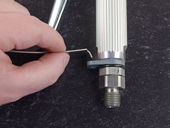Graco Paint Sprayers 17C325 2015 Gun Rebuild, Loosen the Trigger Guard: step 6, image 2 of 3