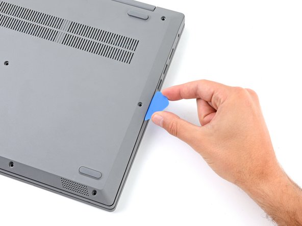 Lenovo IdeaPad 3-15IIL05 RAM Replacement, Release the right clips: crwdns2935265:06crwdnd2935265:02crwdnd2935265:03crwdne2935265:0