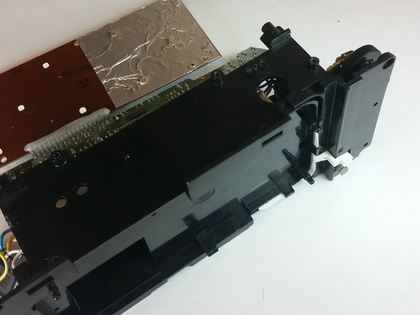 RCA RP3715A Motherboard Replacement, Lift the top piece of motherboard: crwdns2935265:016crwdnd2935265:03crwdnd2935265:03crwdne2935265:0