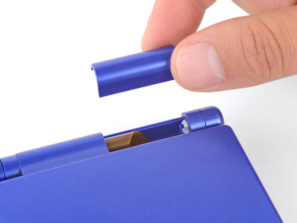 How to Reshell Your Game Boy Advance SP, Remove the hinge cover: crwdns2935265:024crwdnd2935265:02crwdnd2935265:02crwdne2935265:0