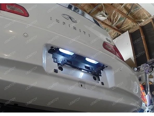 How to Install LED License Plate Lights, Putting the license plate assembly back: crwdns2935265:04crwdnd2935265:02crwdnd2935265:02crwdne2935265:0