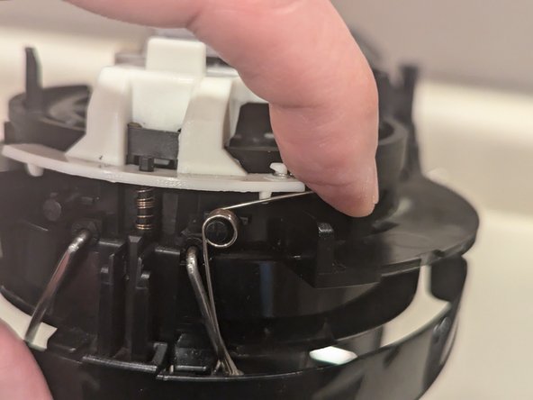 Nespresso Vertuo Evoluo Bearing Replacement, Re-attach capsule catch bar springs: crwdns2935265:019crwdnd2935265:03crwdnd2935265:03crwdne2935265:0