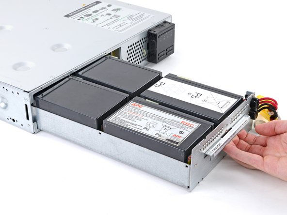 APC Smart-UPS SMT1500RM2UC Battery Cartridge Replacement, Remove the battery cartridge: crwdns2935265:07crwdnd2935265:02crwdnd2935265:02crwdne2935265:0