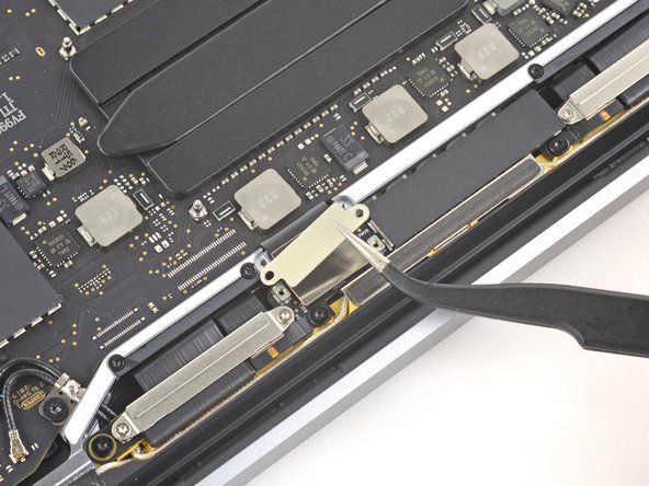 MacBook Pro 13" 2022 (M2) Display Assembly Replacement, Remove the display cable cover: crwdns2935265:016crwdnd2935265:02crwdnd2935265:02crwdne2935265:0