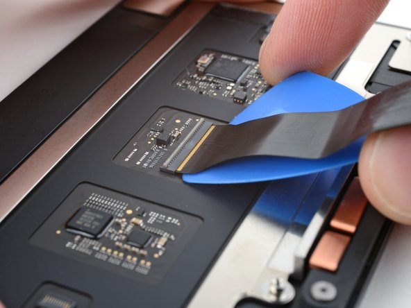 MacBook Pro 14" Late 2023 (M3) Trackpad Replacement, Separate the trackpad cable adhesive: crwdns2935265:027crwdnd2935265:03crwdnd2935265:03crwdne2935265:0