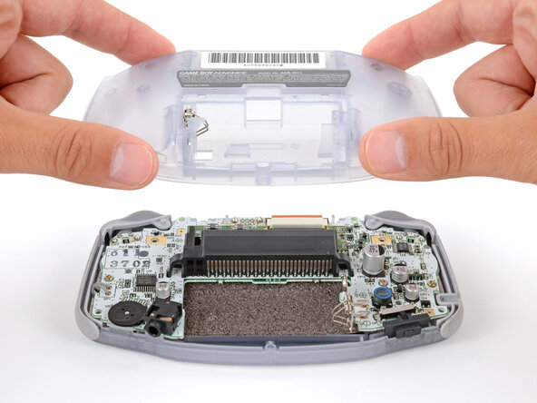 How to Reshell Your Game Boy Advance, Remove the back shell: crwdns2935265:05crwdnd2935265:02crwdnd2935265:02crwdne2935265:0