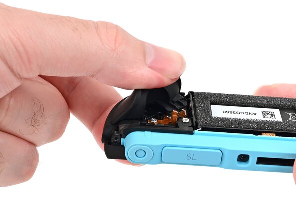 Joy-Con 2 (Left) Joystick Replacement, Install the trigger: crwdns2935265:047crwdnd2935265:03crwdnd2935265:03crwdne2935265:0