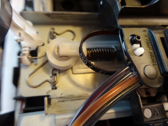 How to Unclog Brother Inkjet Print head Nozzles, Removing the print head from the rails: crwdns2935265:012crwdnd2935265:03crwdnd2935265:03crwdne2935265:0