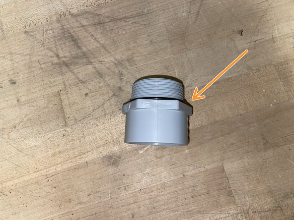GI Node with Pressure Transducer Assembly, Attaching Pipe Fitting to Enclosure: step 5, image 2 of 3