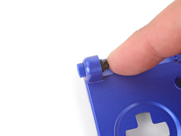 How to Reshell Your Game Boy Advance SP, Remove the left hinge: crwdns2935265:031crwdnd2935265:01crwdnd2935265:03crwdne2935265:0