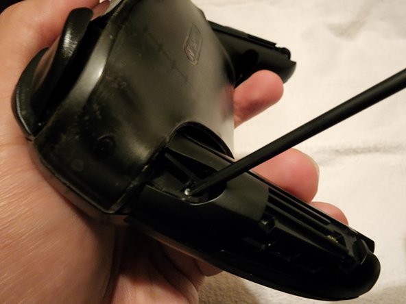 How to Eliminate Joystick Drift from a Nintendo Switch Pro Controller, Reinstalling the backplate: crwdns2935265:010crwdnd2935265:03crwdnd2935265:03crwdne2935265:0