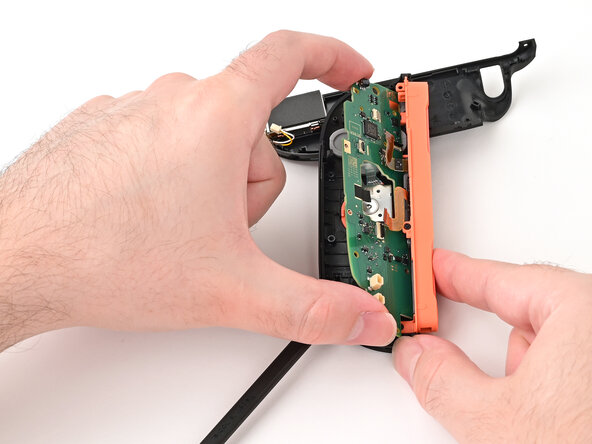 Joy-Con 2 (Right) Joystick Replacement, Remove the board: crwdns2935265:025crwdnd2935265:02crwdnd2935265:03crwdne2935265:0