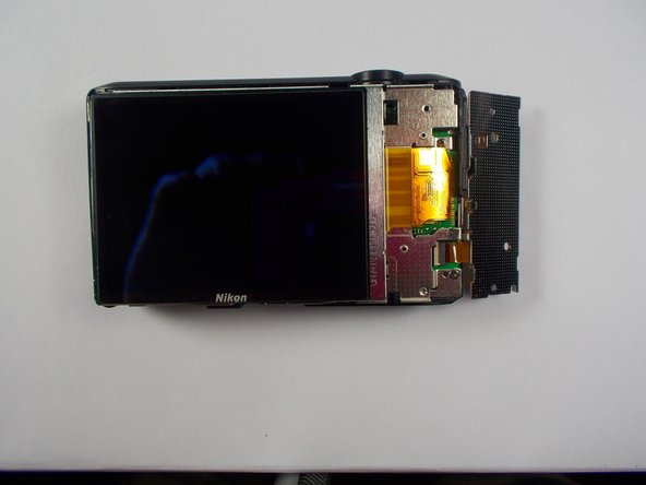 Nikon Coolpix S6800 Button Assembly Replacement: crwdns2935265:06crwdnd2935265:02crwdnd2935265:02crwdne2935265:0