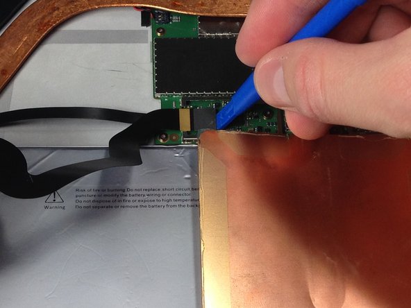 Unplug the connection with a plastic opening tool.