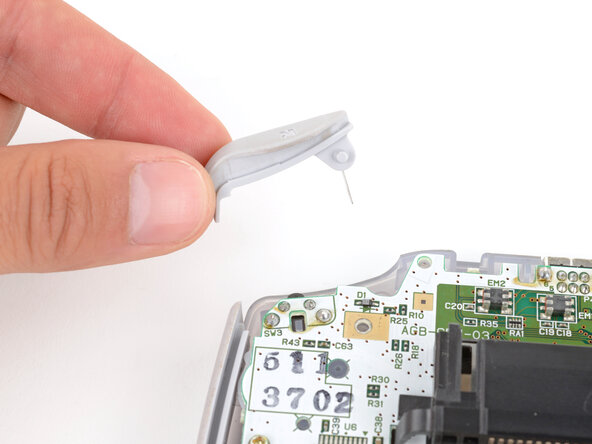 Game Boy Advance Speaker Replacement, Remove the shoulder buttons: crwdns2935265:06crwdnd2935265:03crwdnd2935265:03crwdne2935265:0