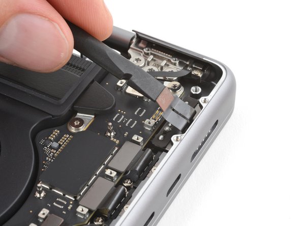 MacBook Pro 14" Late 2023 (M3) USB-C Ports Replacement, Disconnect the MagSafe port: crwdns2935265:029crwdnd2935265:02crwdnd2935265:02crwdne2935265:0