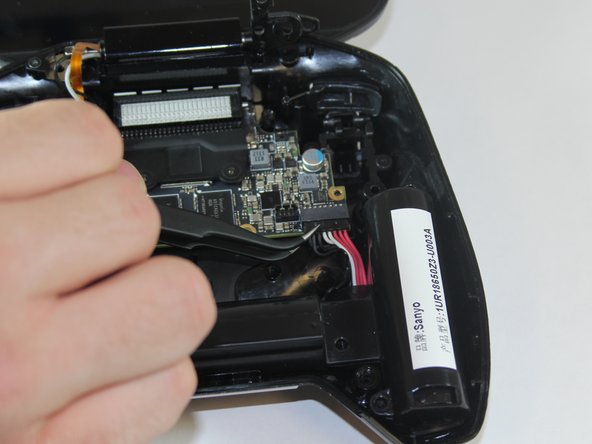 Nvidia Shield Joystick Replacement, Remove Battery Cables: crwdns2935265:03crwdnd2935265:02crwdnd2935265:03crwdne2935265:0