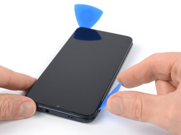 Xiaomi Redmi Note 9T Screen Replacement, Release the left edge plastic clips: crwdns2935265:06crwdnd2935265:03crwdnd2935265:03crwdne2935265:0