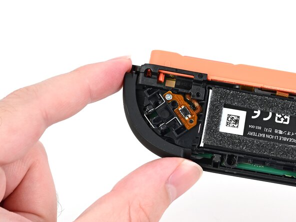 Joy-Con 2 (Right) Joystick Replacement, Install the bumper: crwdns2935265:038crwdnd2935265:02crwdnd2935265:02crwdne2935265:0