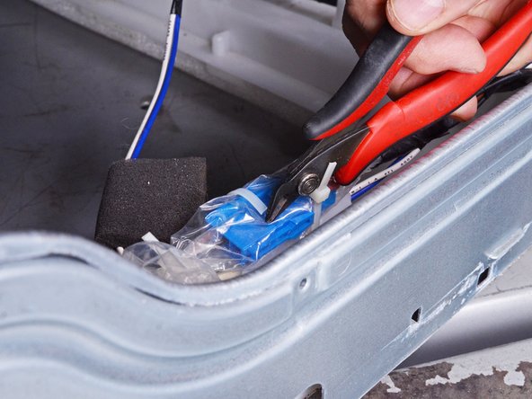 LG Front Load Washing Machine Drain Pump Motor Replacement, Unwrap the pump assembly cables: crwdns2935265:029crwdnd2935265:02crwdnd2935265:03crwdne2935265:0