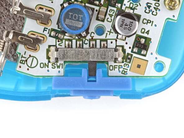 How to Reshell Your Game Boy Advance, Install the power switch cover: crwdns2935265:030crwdnd2935265:03crwdnd2935265:03crwdne2935265:0